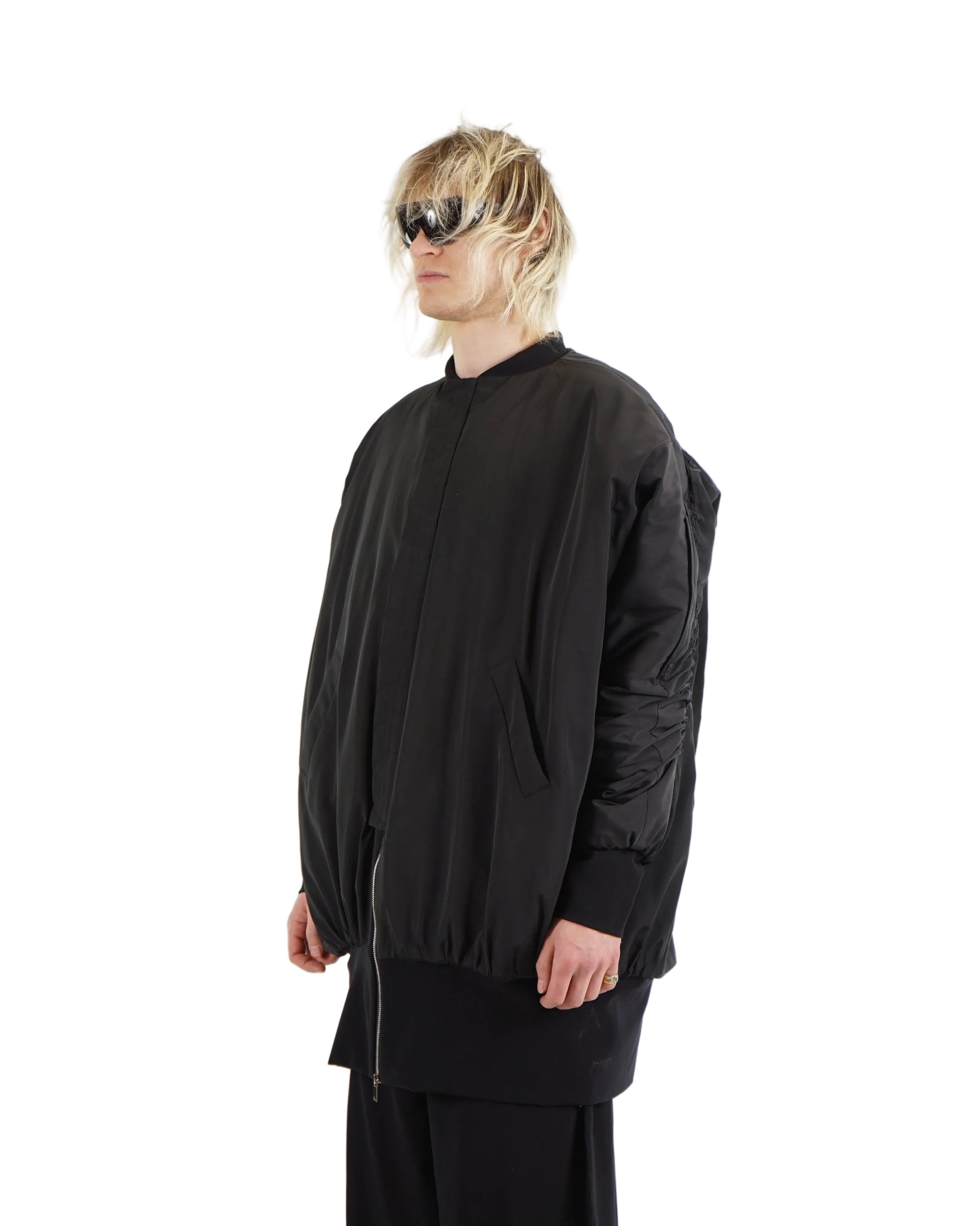 Back detail of gathered oversized bomber jacket