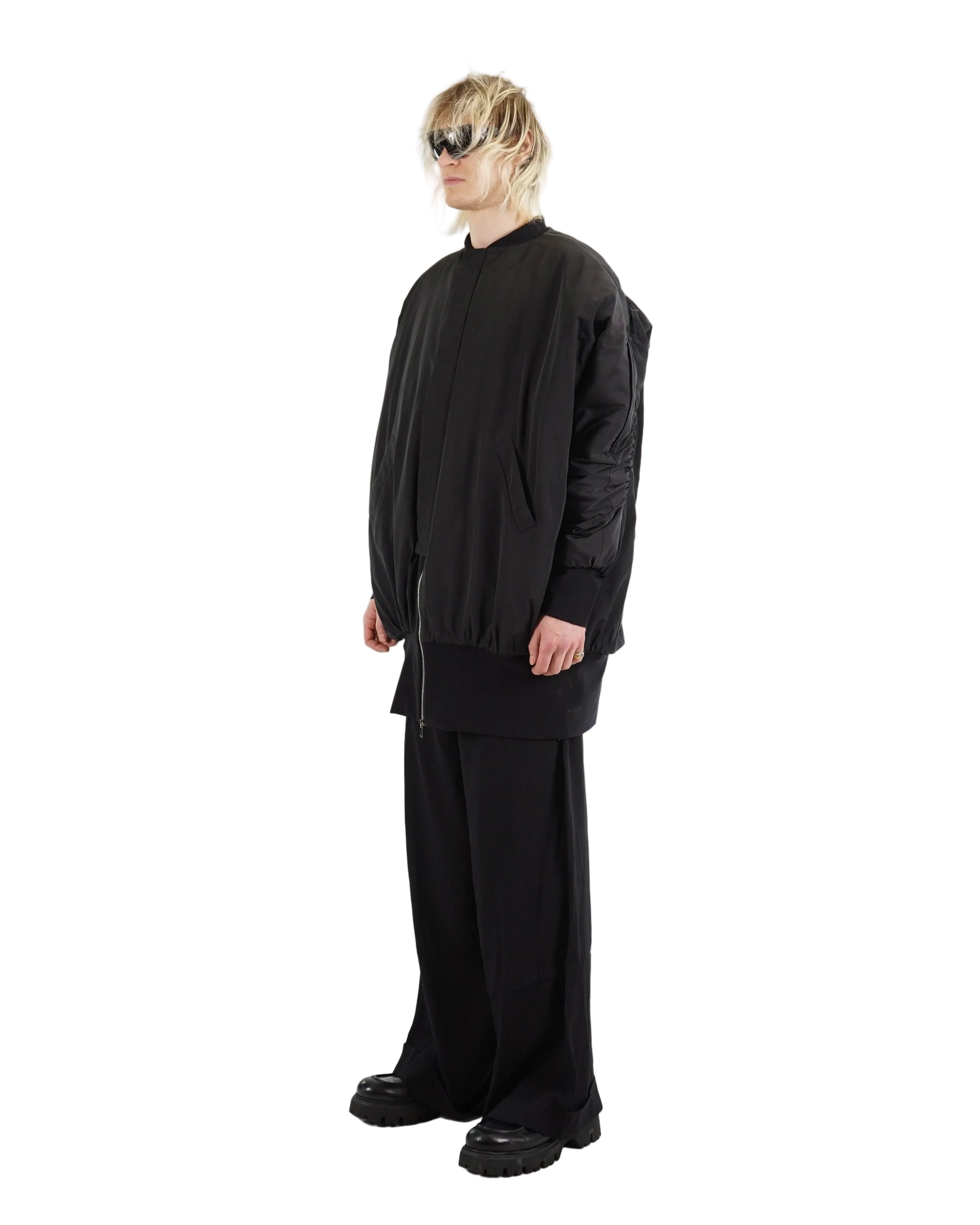 Front view of oversized padded bomber jacket in black