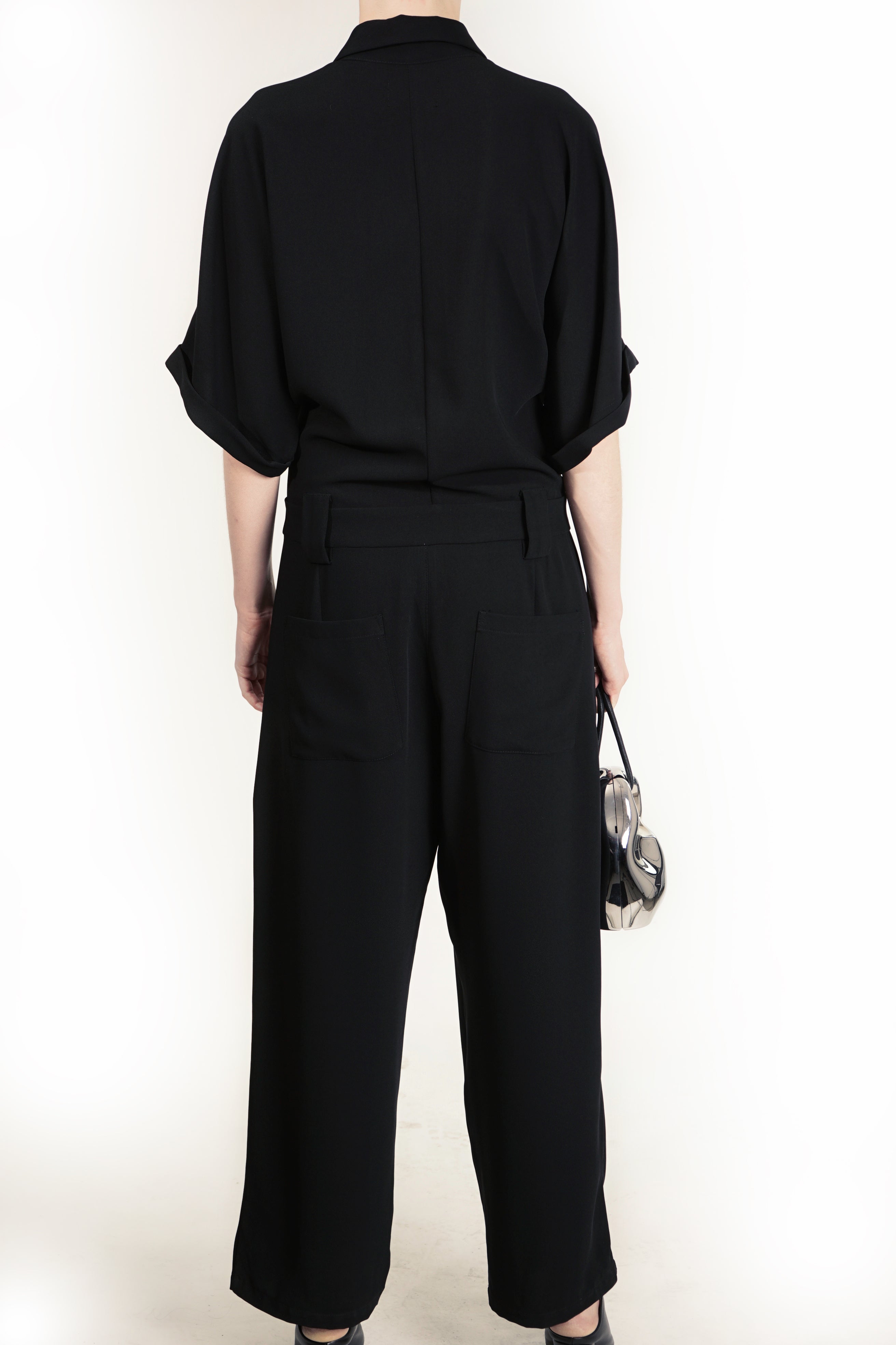 Minimal tailored jumpsuit with tapered legs