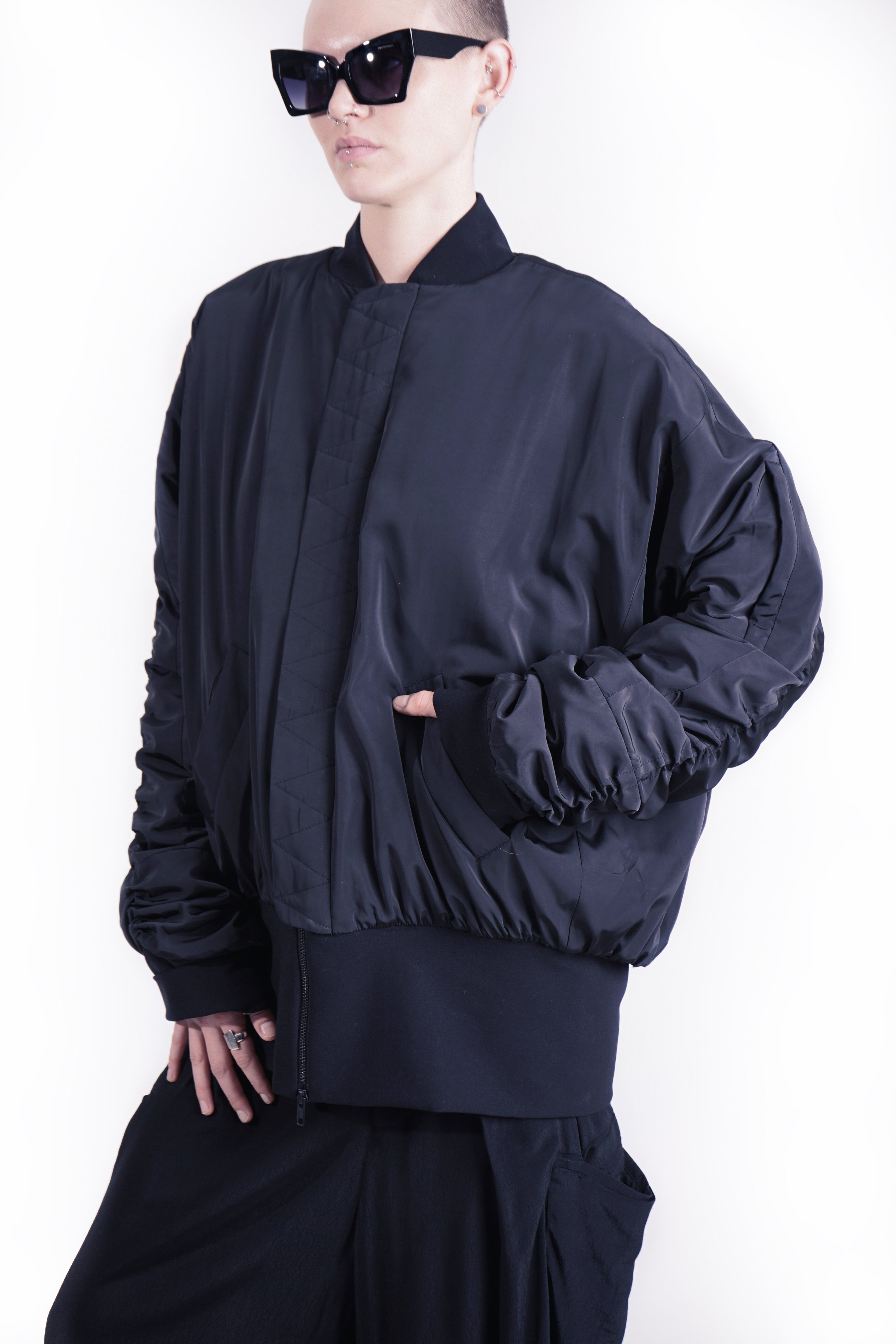 Relaxed black bomber jacket with ribbed hem and collar