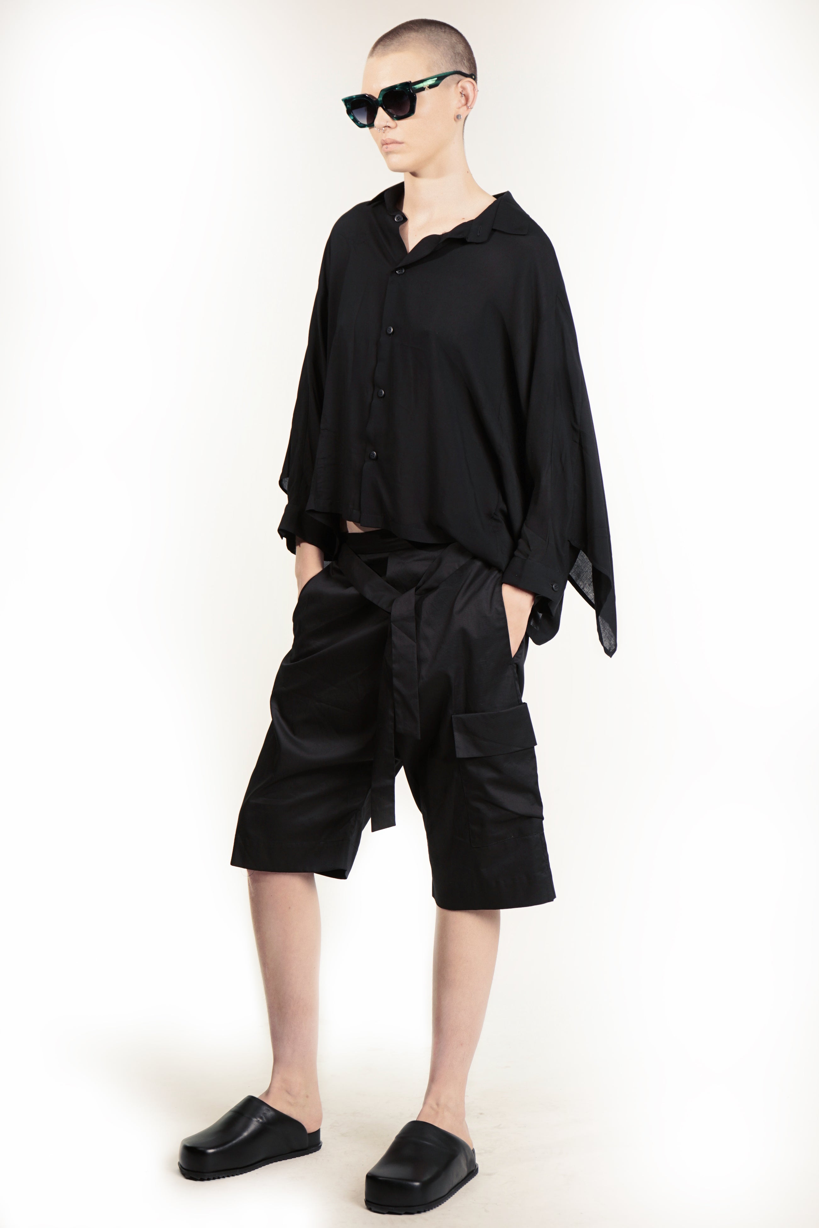 Relaxed black blouse with fluid silhouette