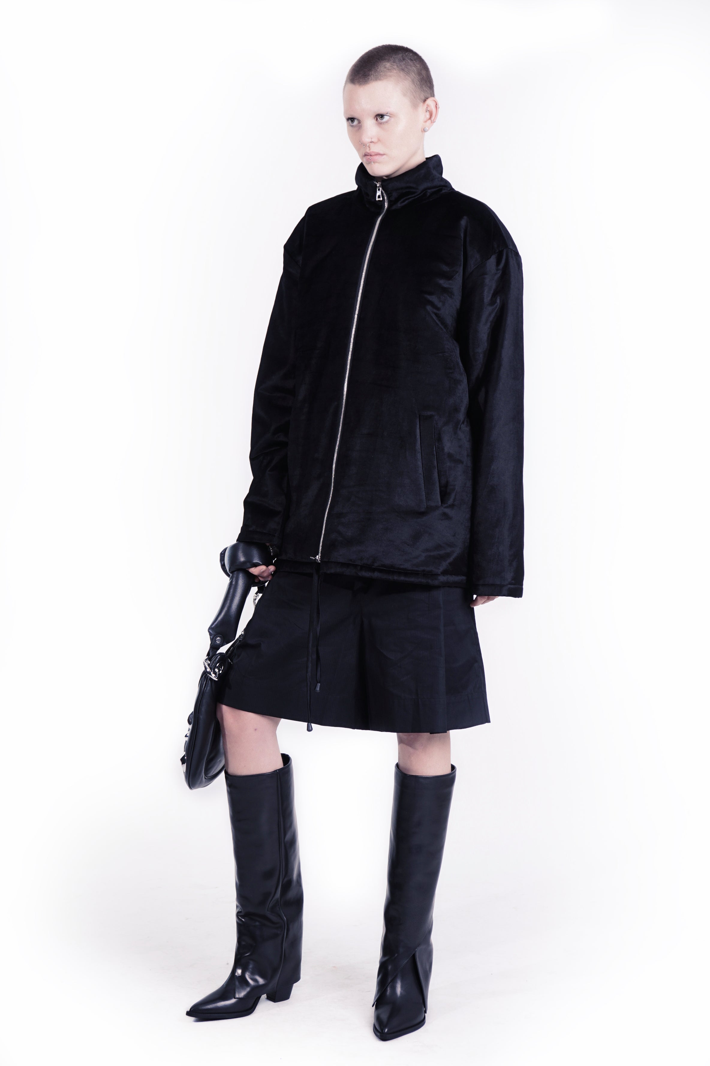 Side view of relaxed velvet jacket with dropped shoulders