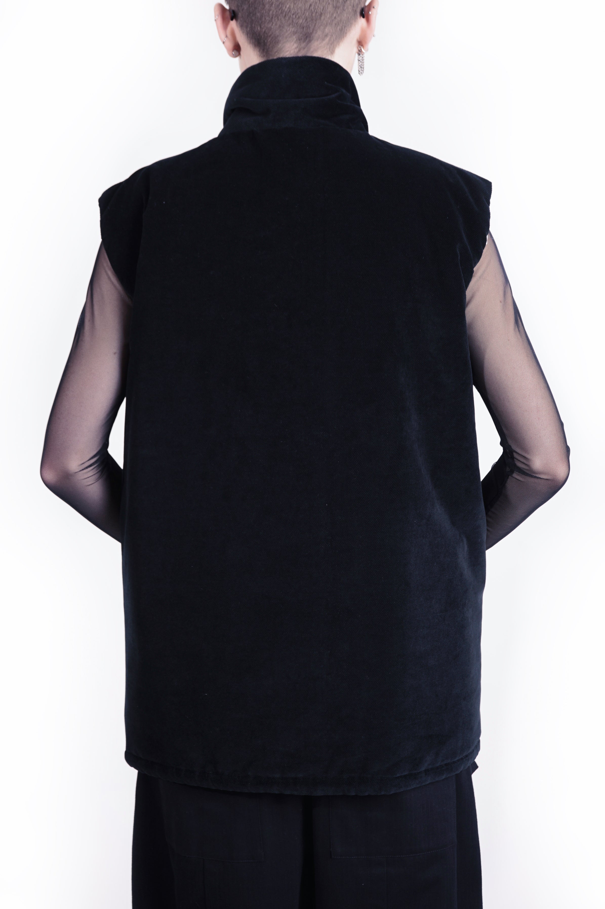 back view of oversized black outerwear vest woth stand collar 