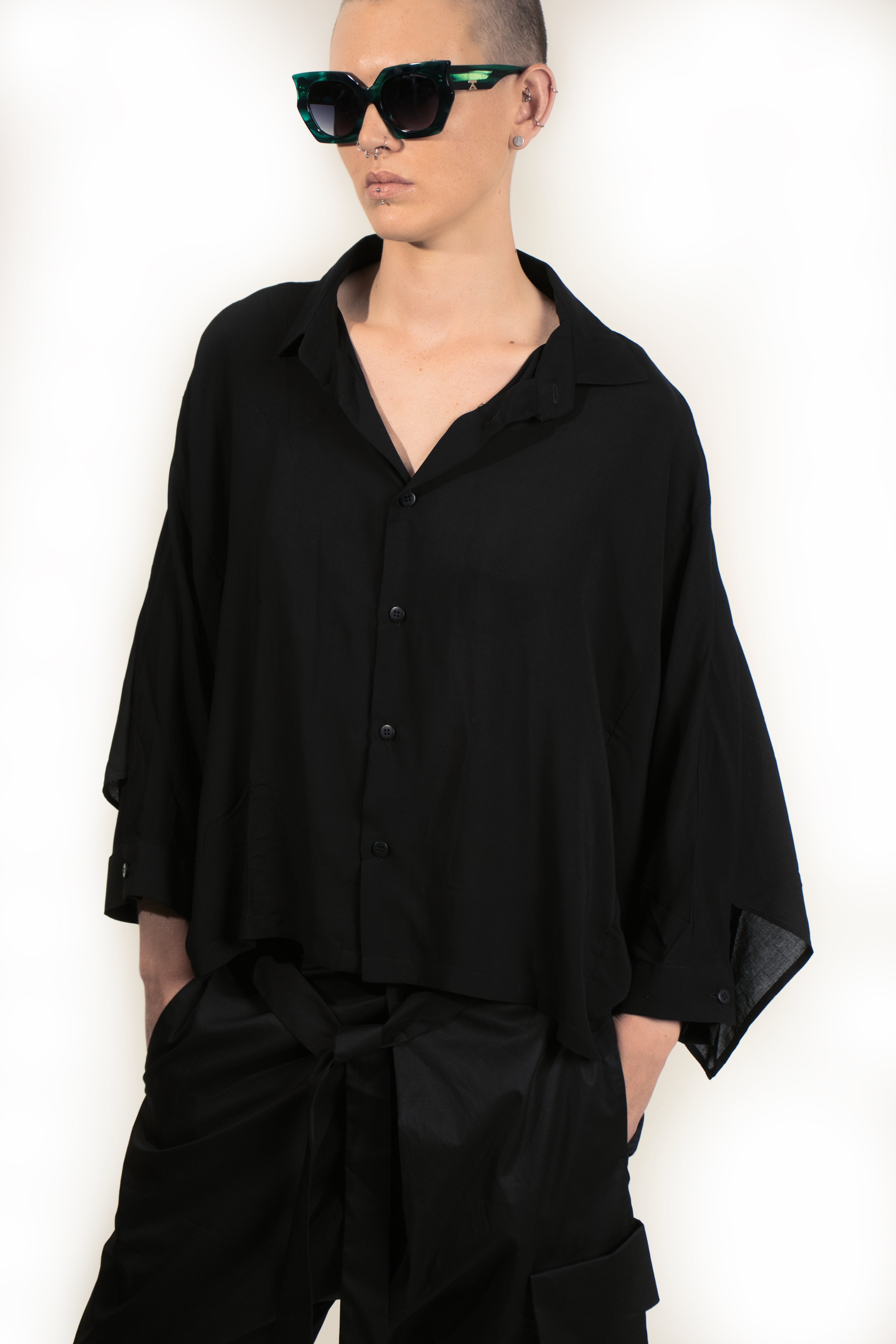 Minimal oversized blouse with midi long sleeves