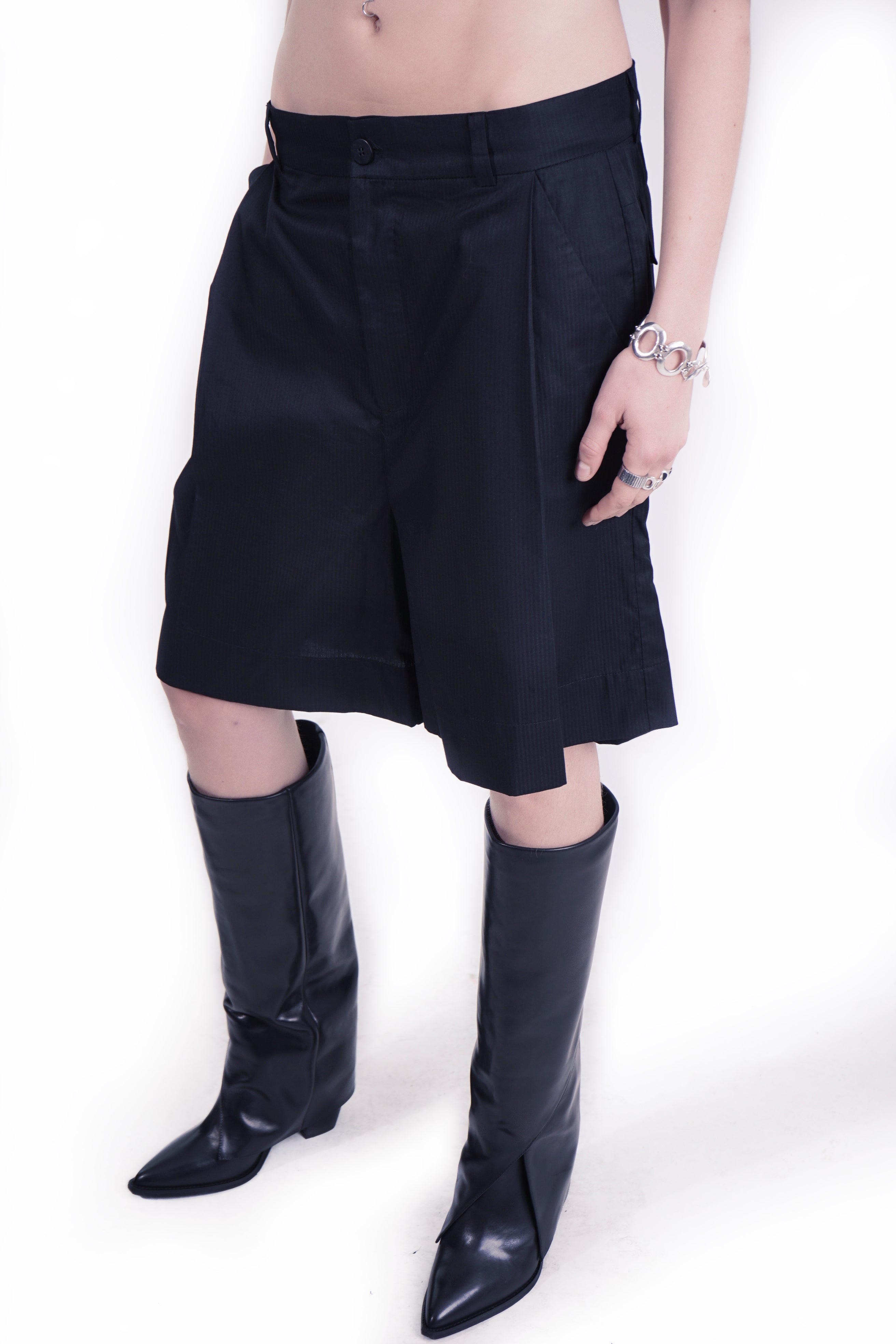 Minimal structured black shorts with architectural silhouette