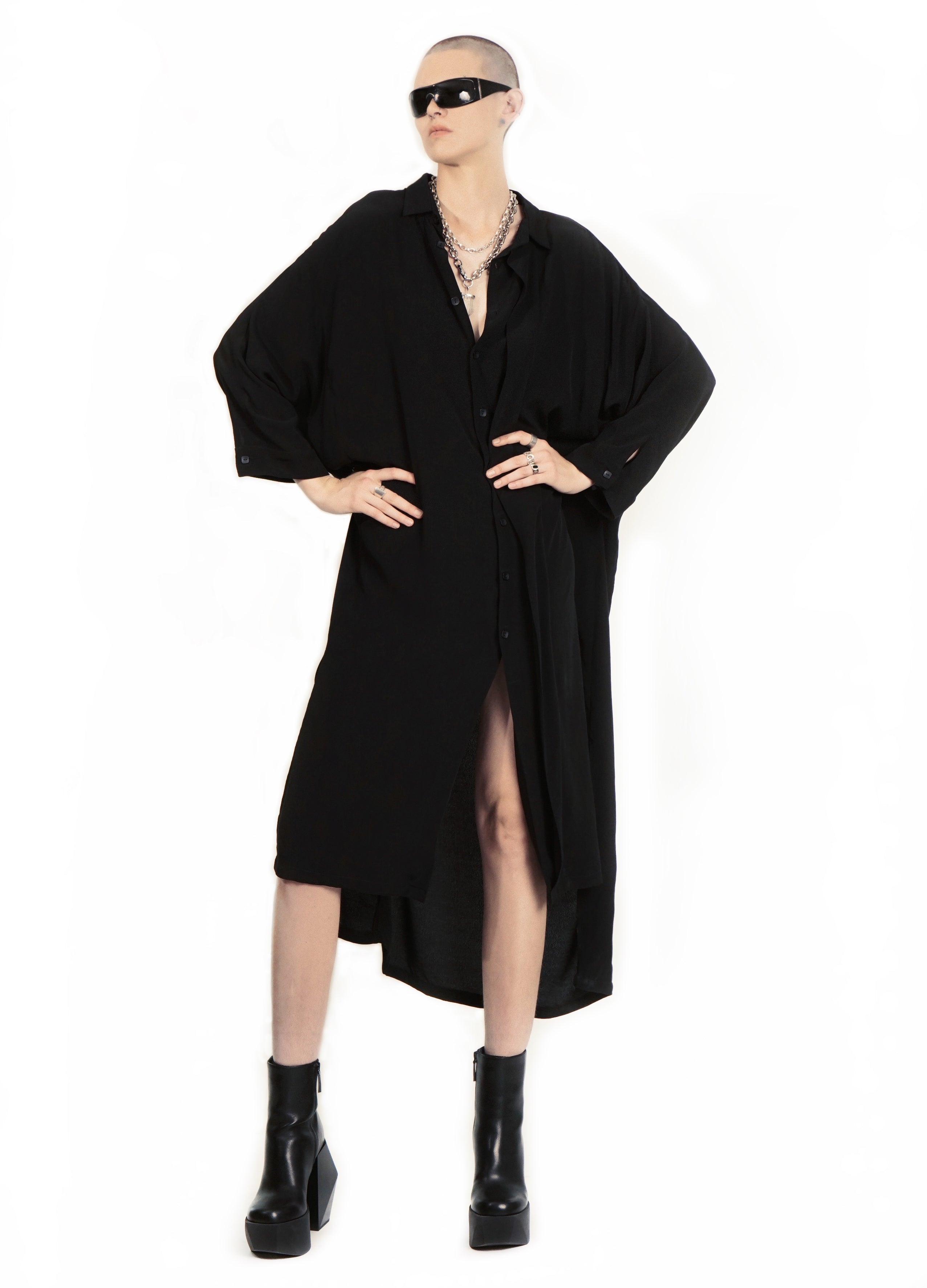 Front view of longline oversized shirt in black