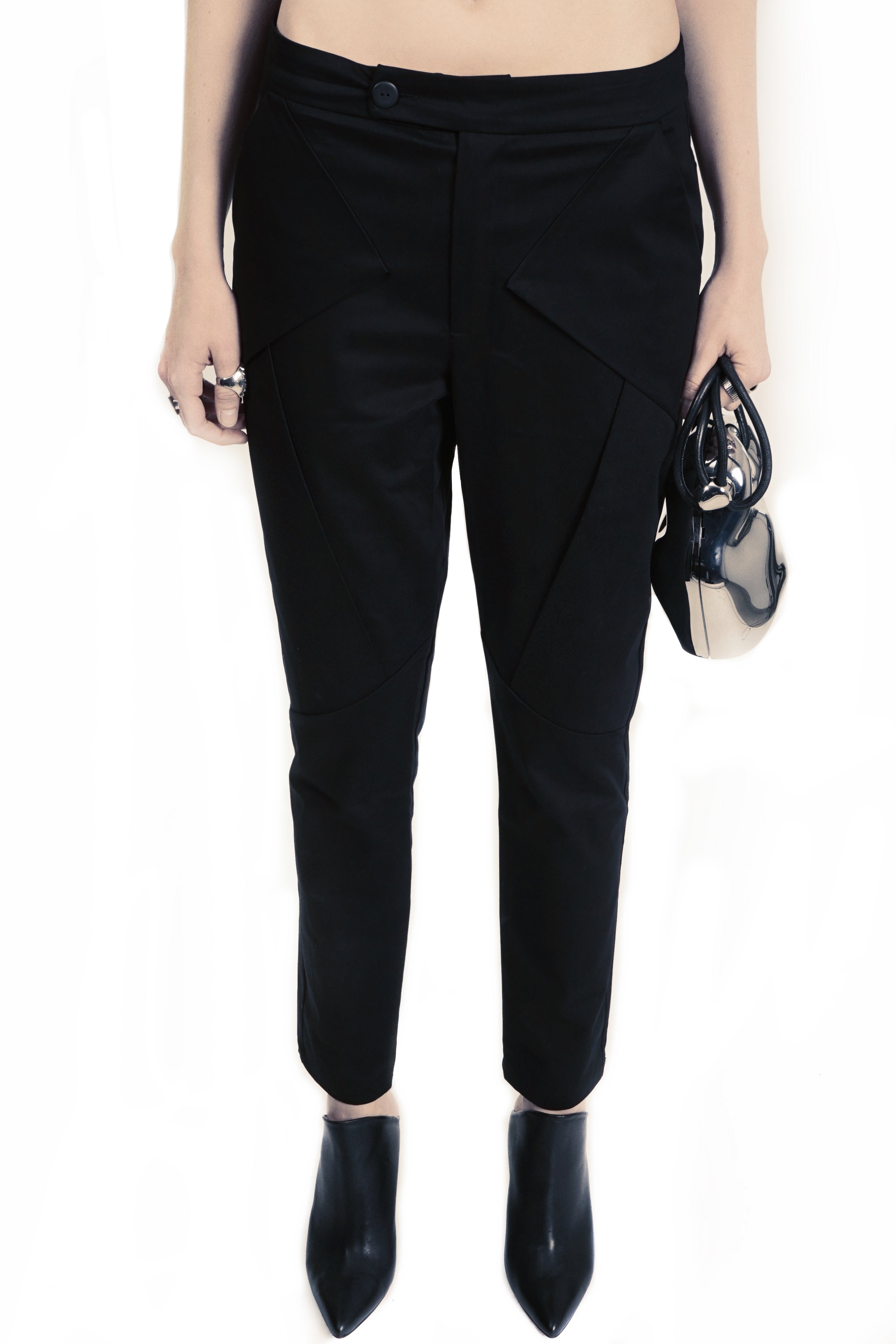 Black geometric trousers with structured layered detailing