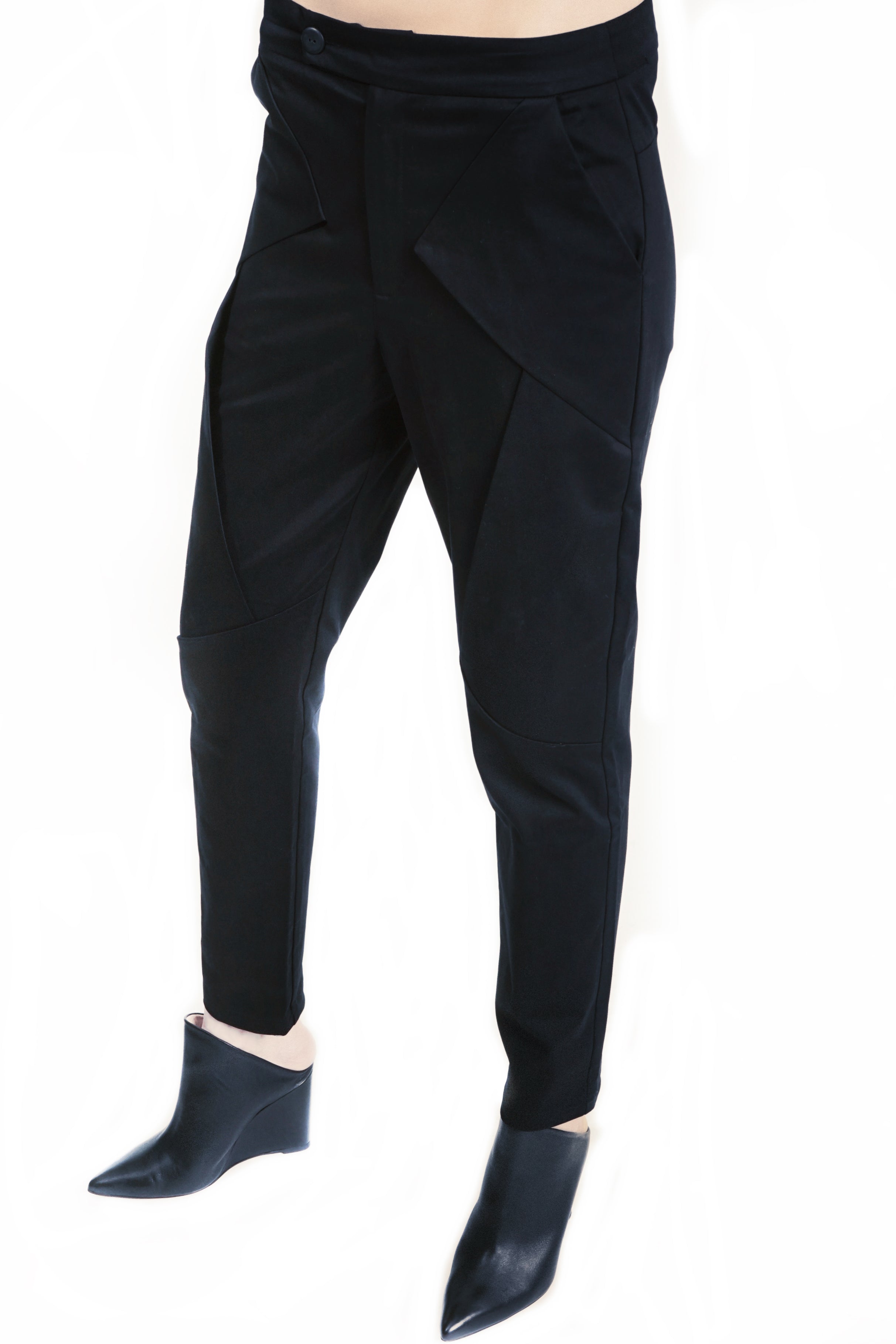 Minimal black trousers with sculptural panel construction