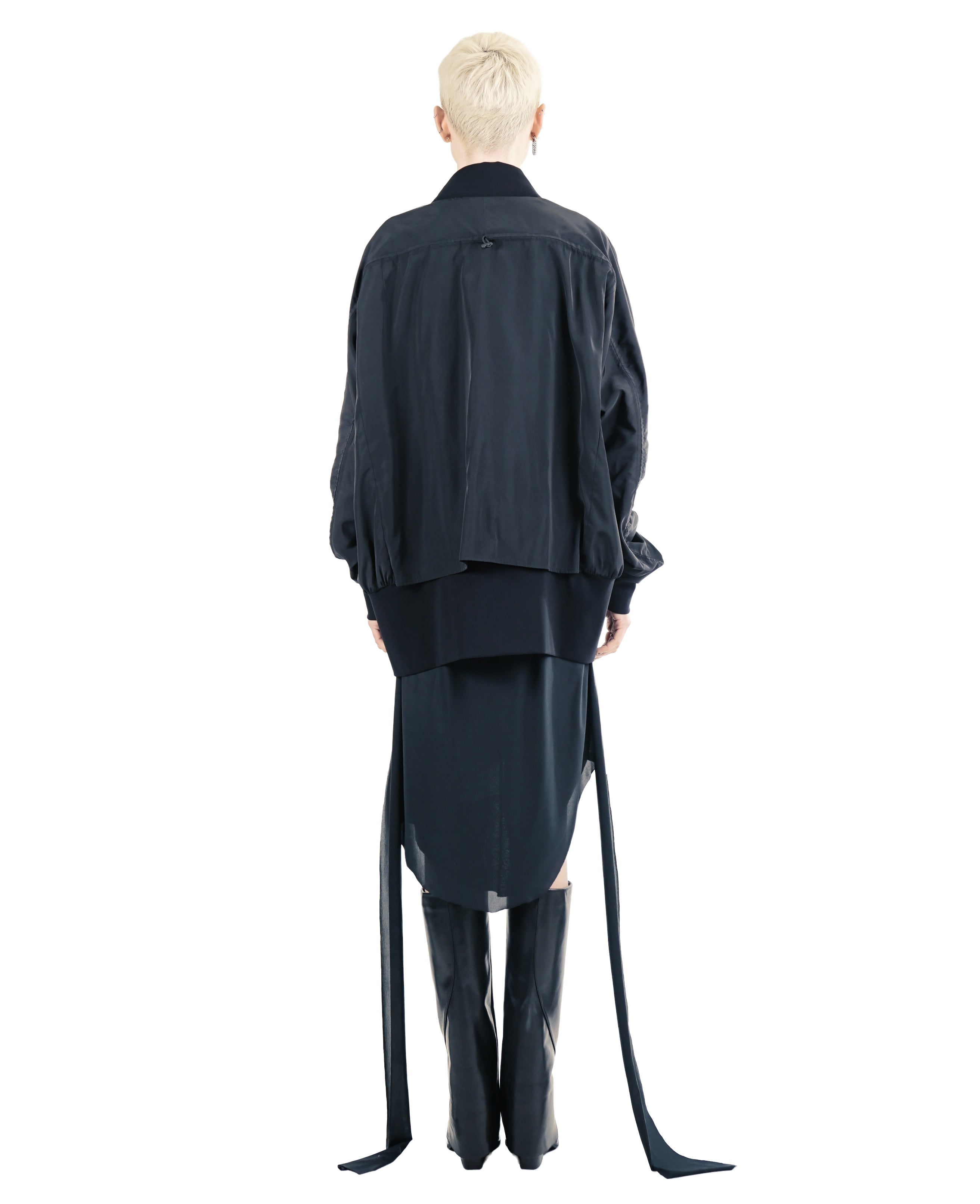 Back view of black long bomber jacket with adjustable elastic string