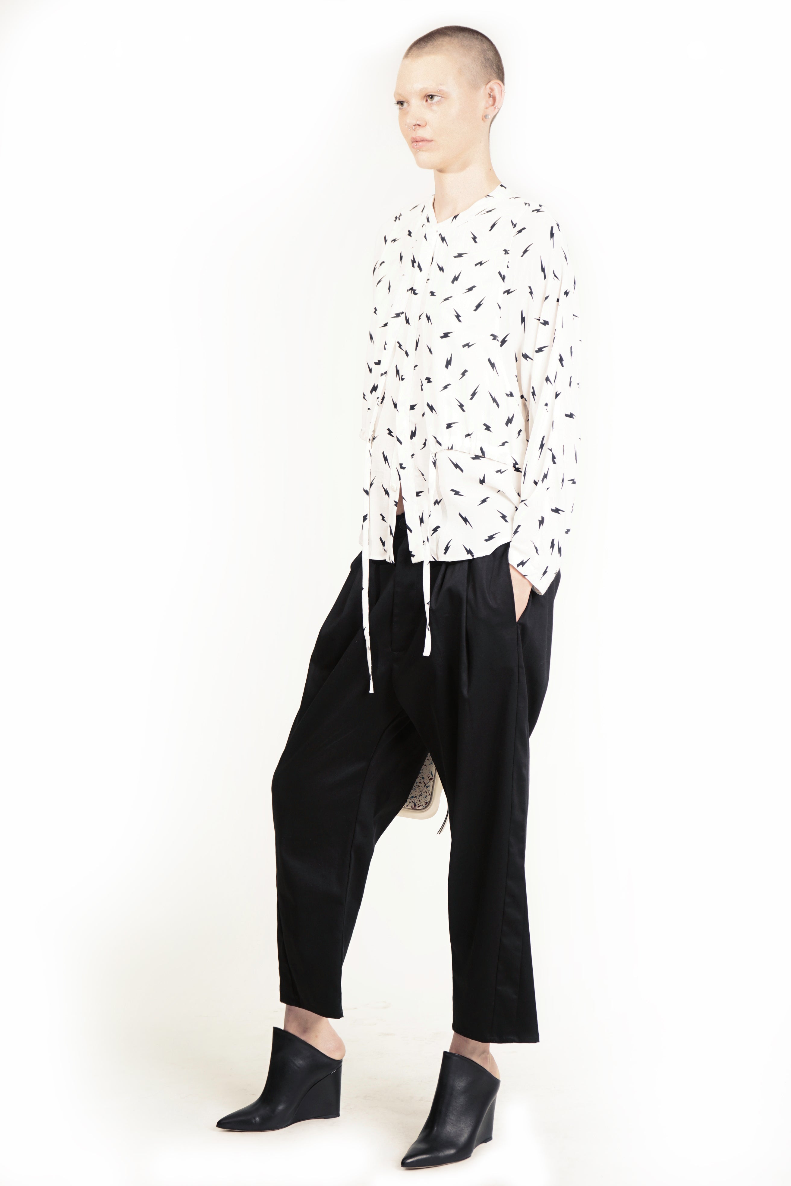 Relaxed bat-cut blouse with concealed front closure