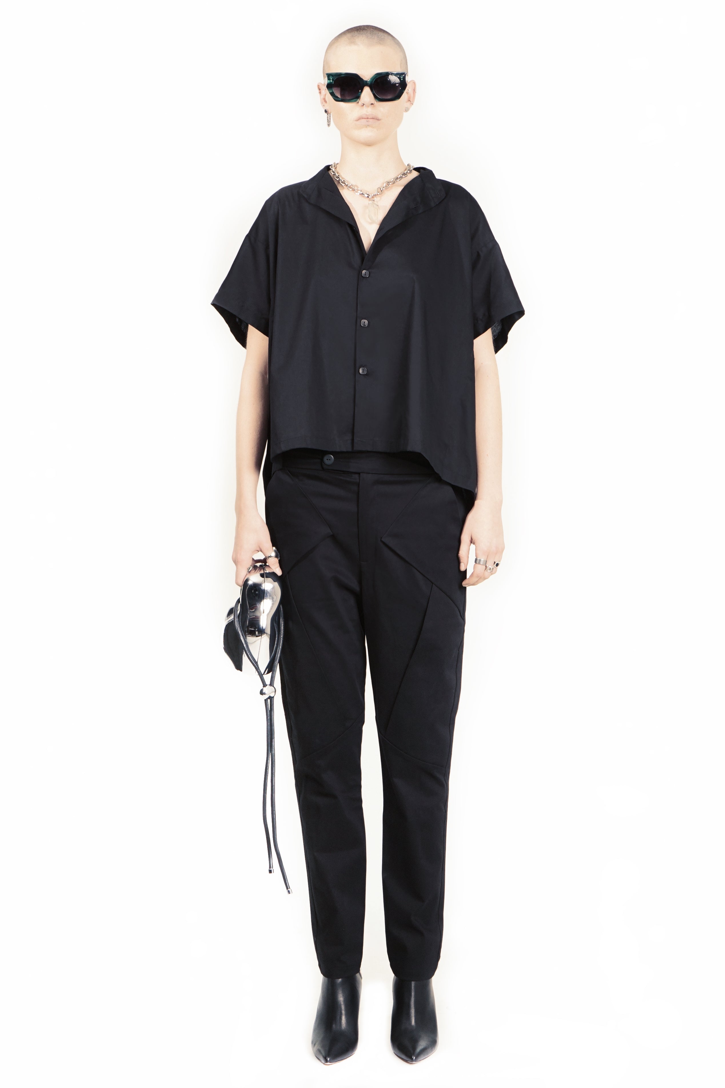Side view of relaxed oversized blouse with stand collar