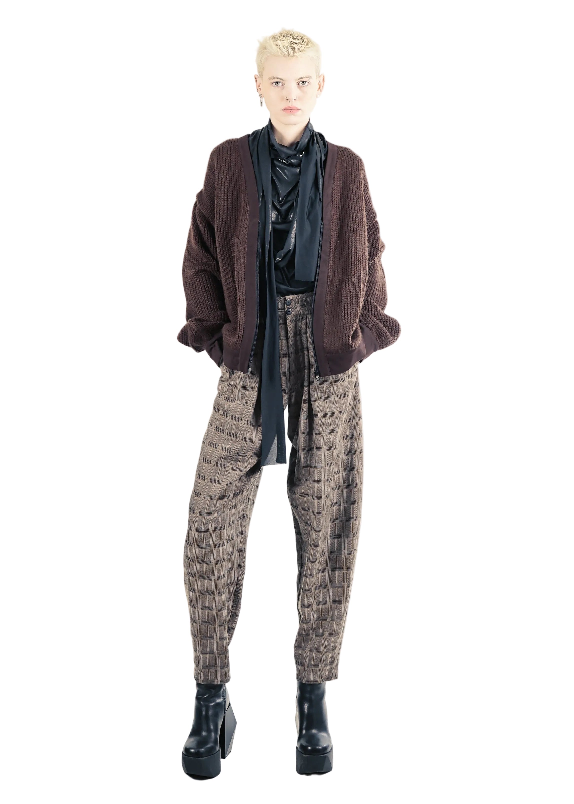Unisex brown cardigan styled with patterned trousers