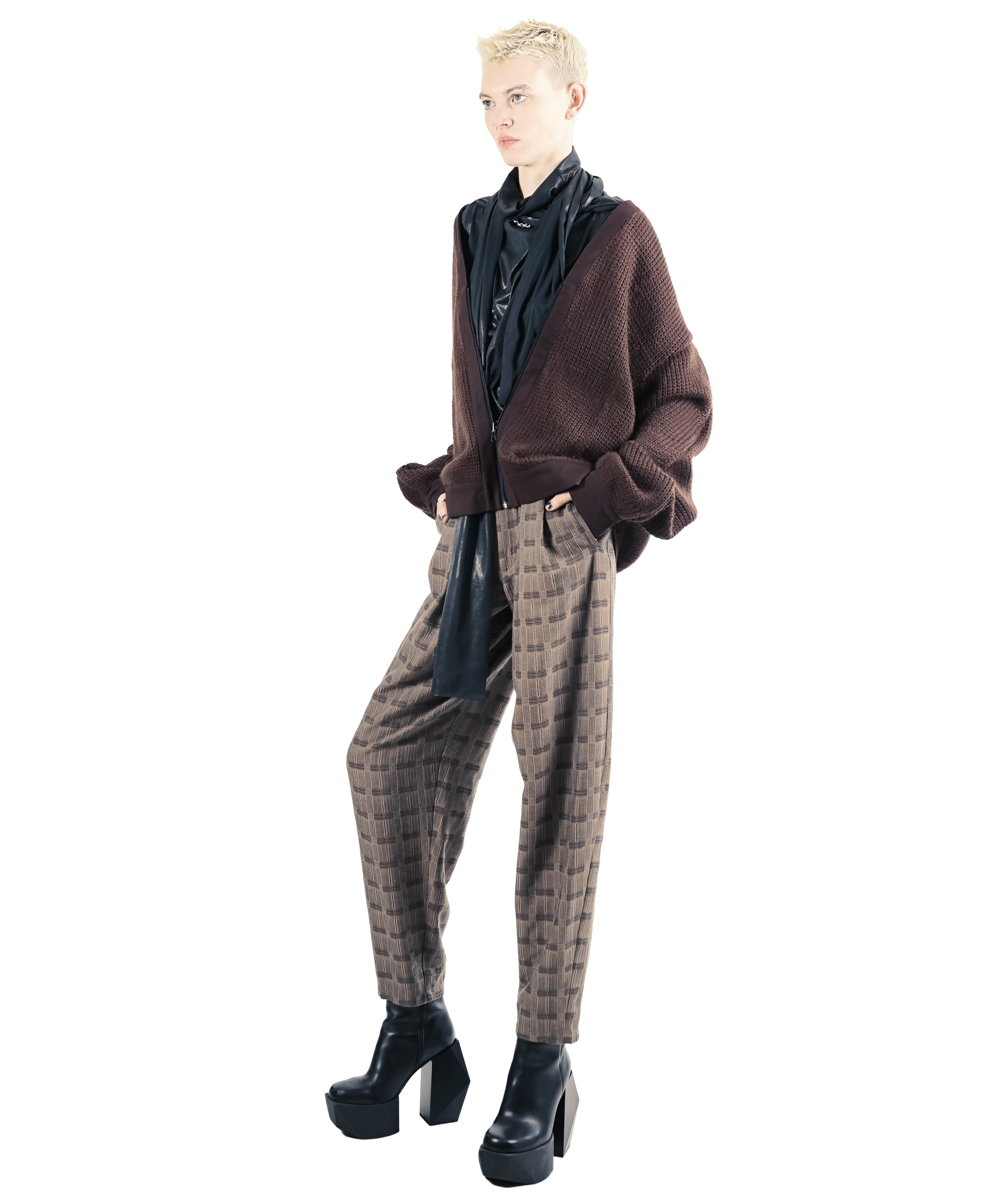 Side view of relaxed brown cardigan with dropped shoulders