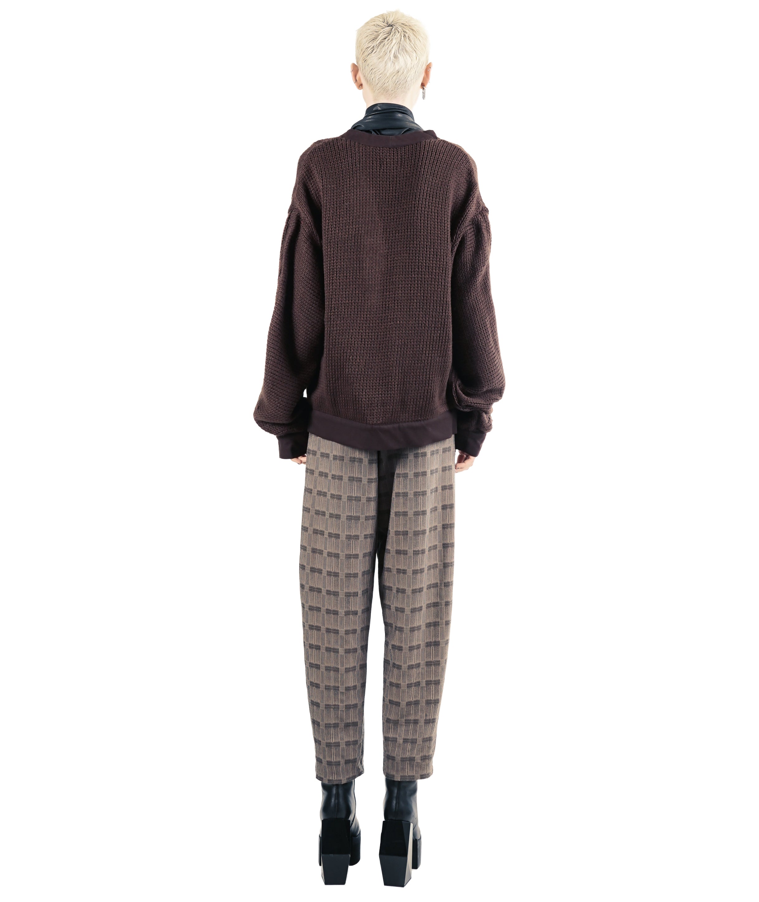 Back view of textured brown cardigan with ribbed hem