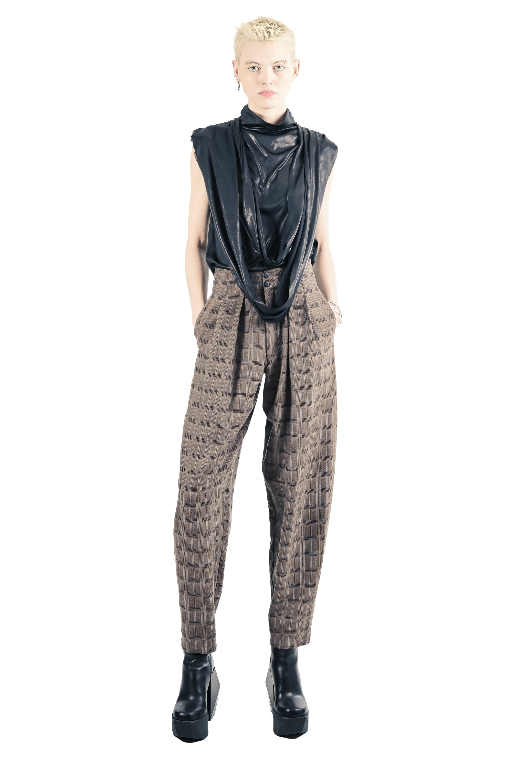 Front view of barrel trousers with structured waistband