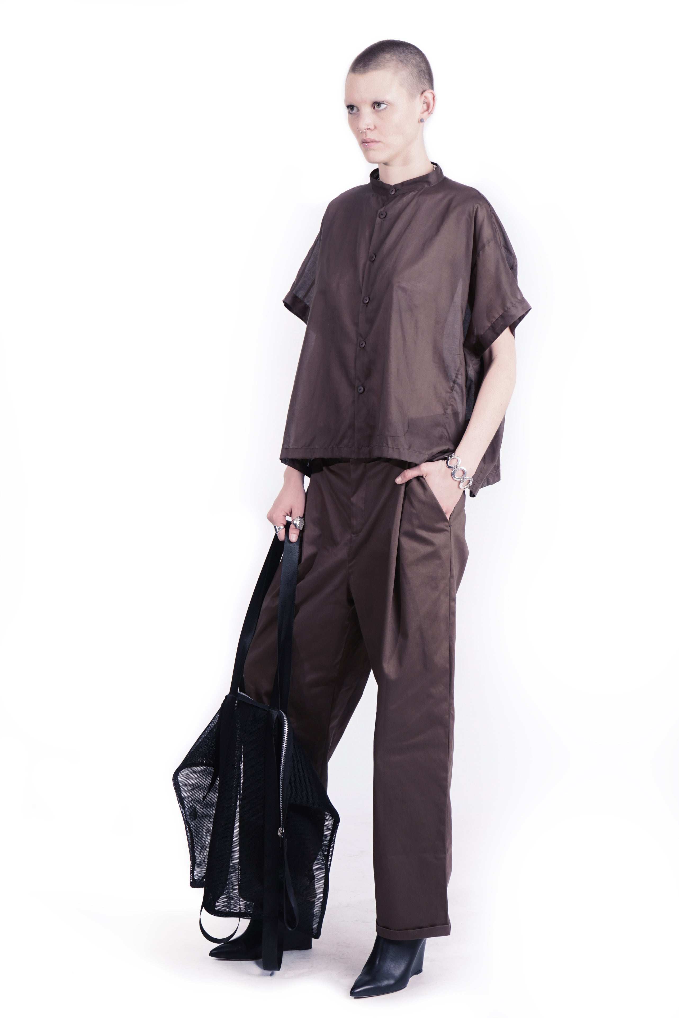 Side view of relaxed oversized blouse with dropped shoulder