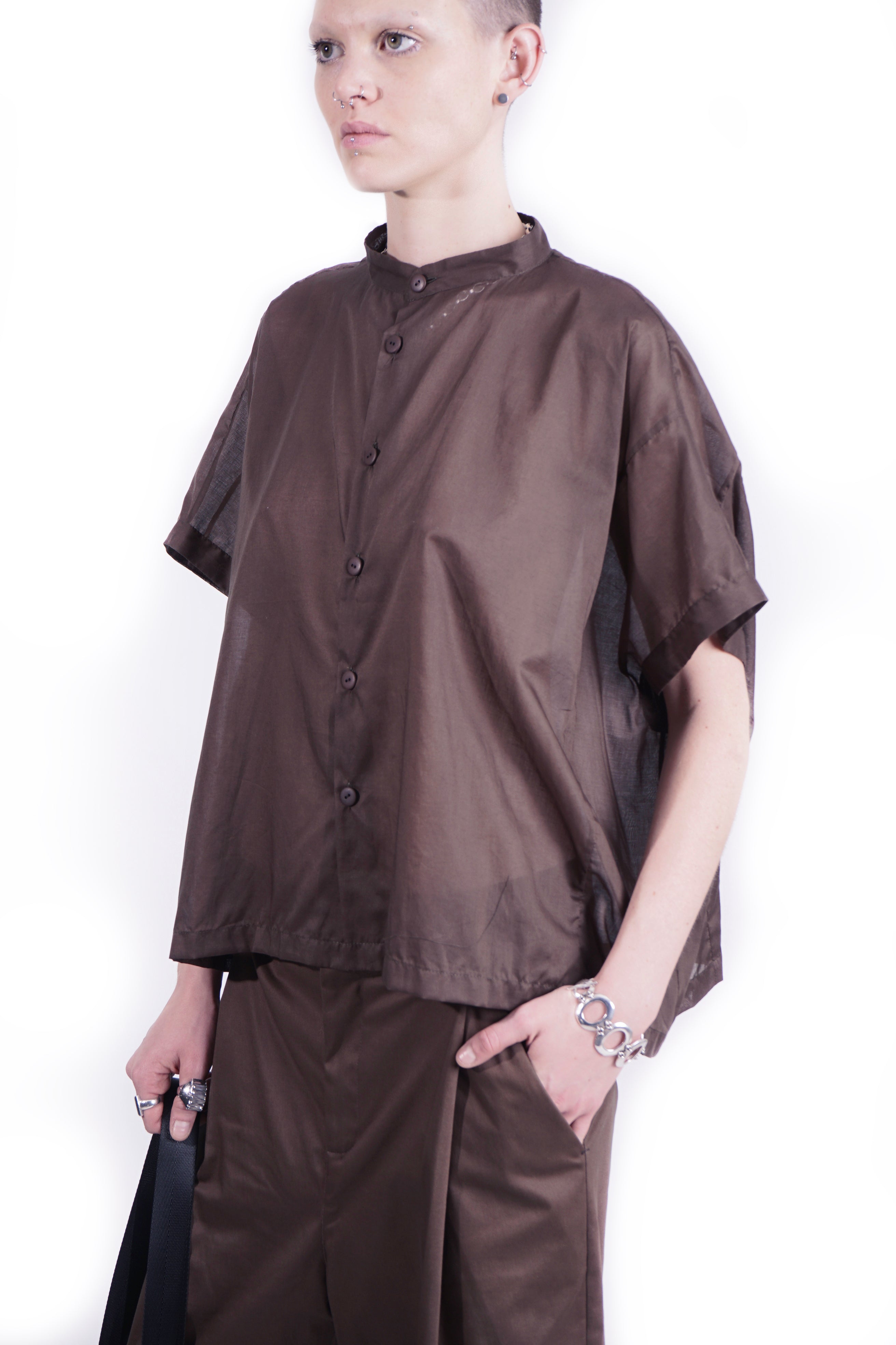 Oversized contemporary sculptural blouse with clean minimal silhouette