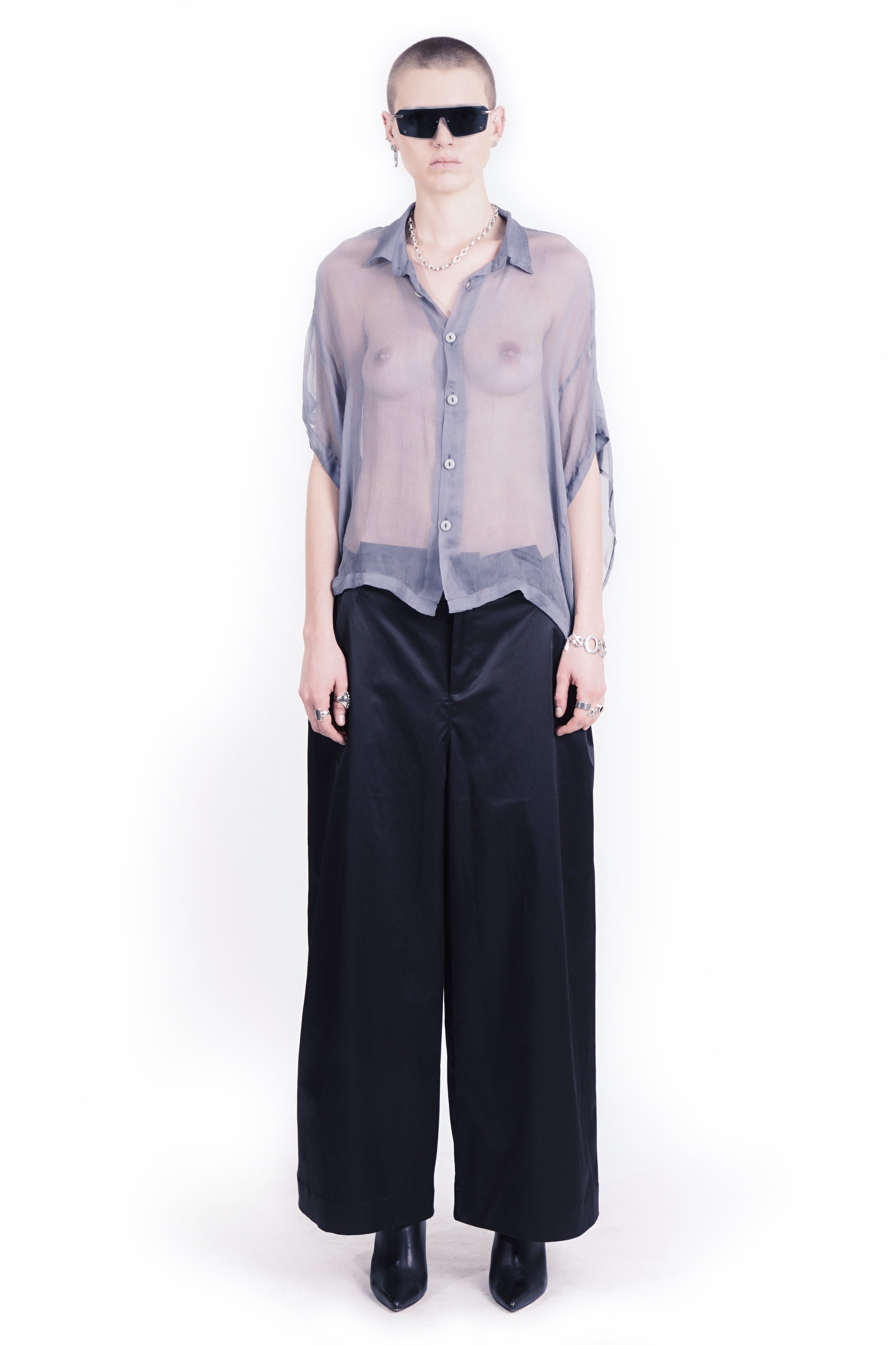 Front view of oversized blue silk  blouse with open mandarin collar and back layer 