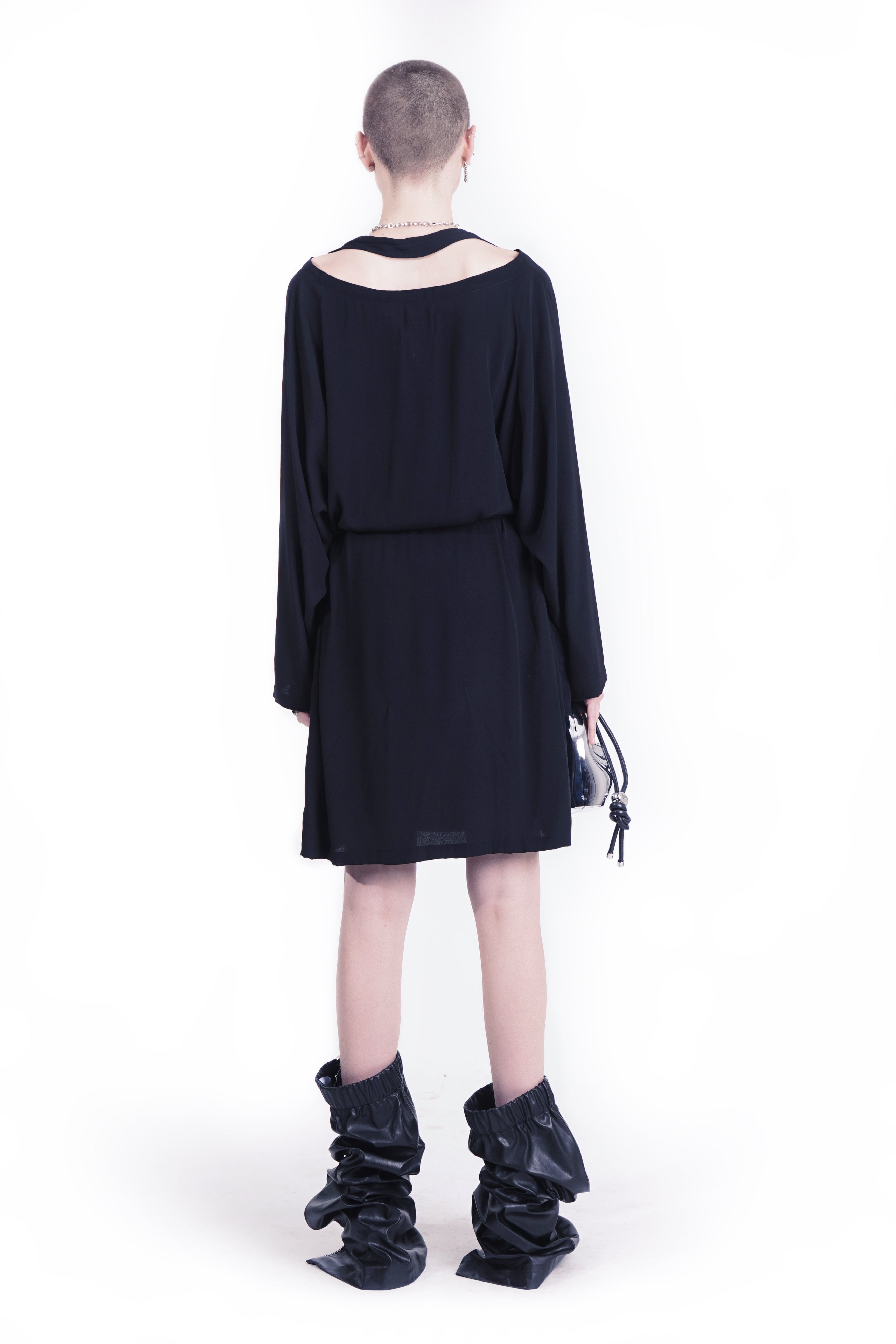 Back  view of neckholder black dress 